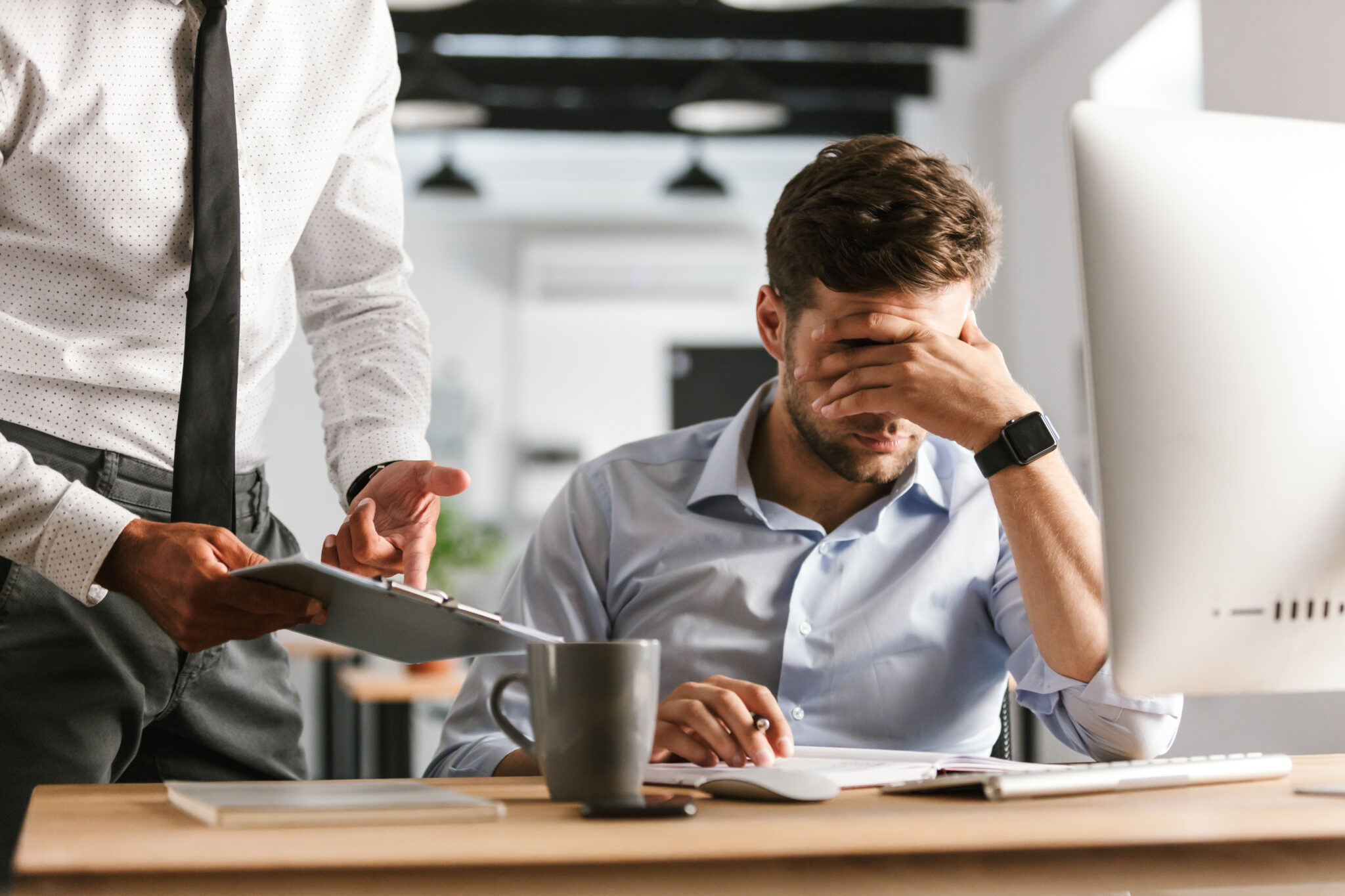 image of displeased business man having problems in work